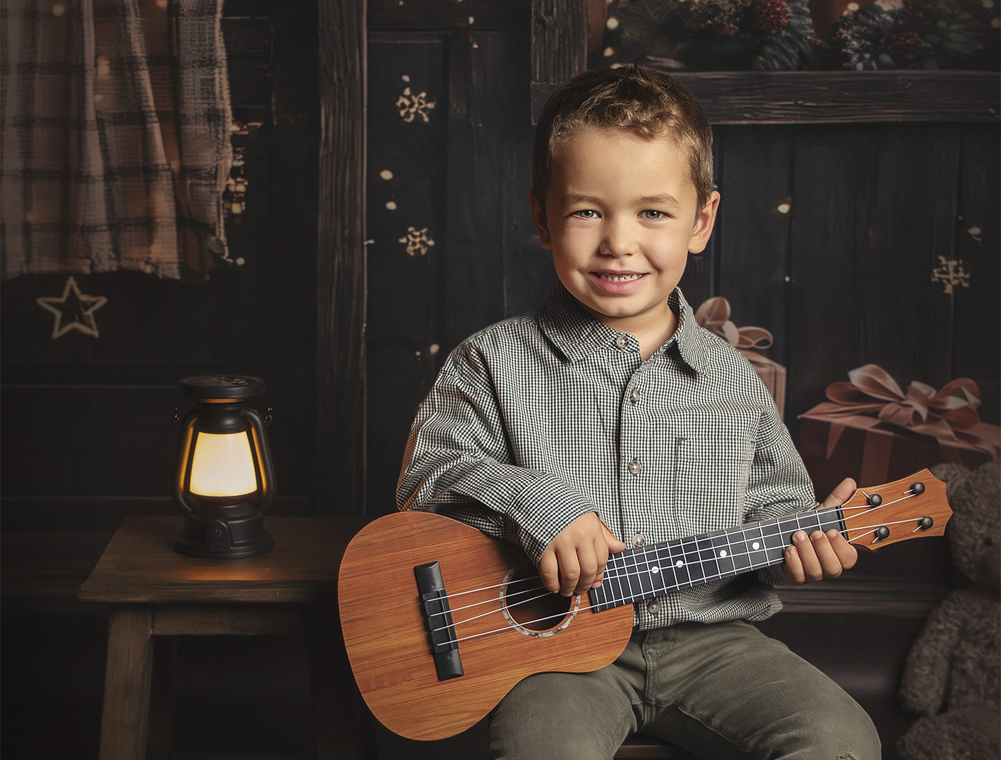 Niño con guitarra Sesión de fotos de navidad