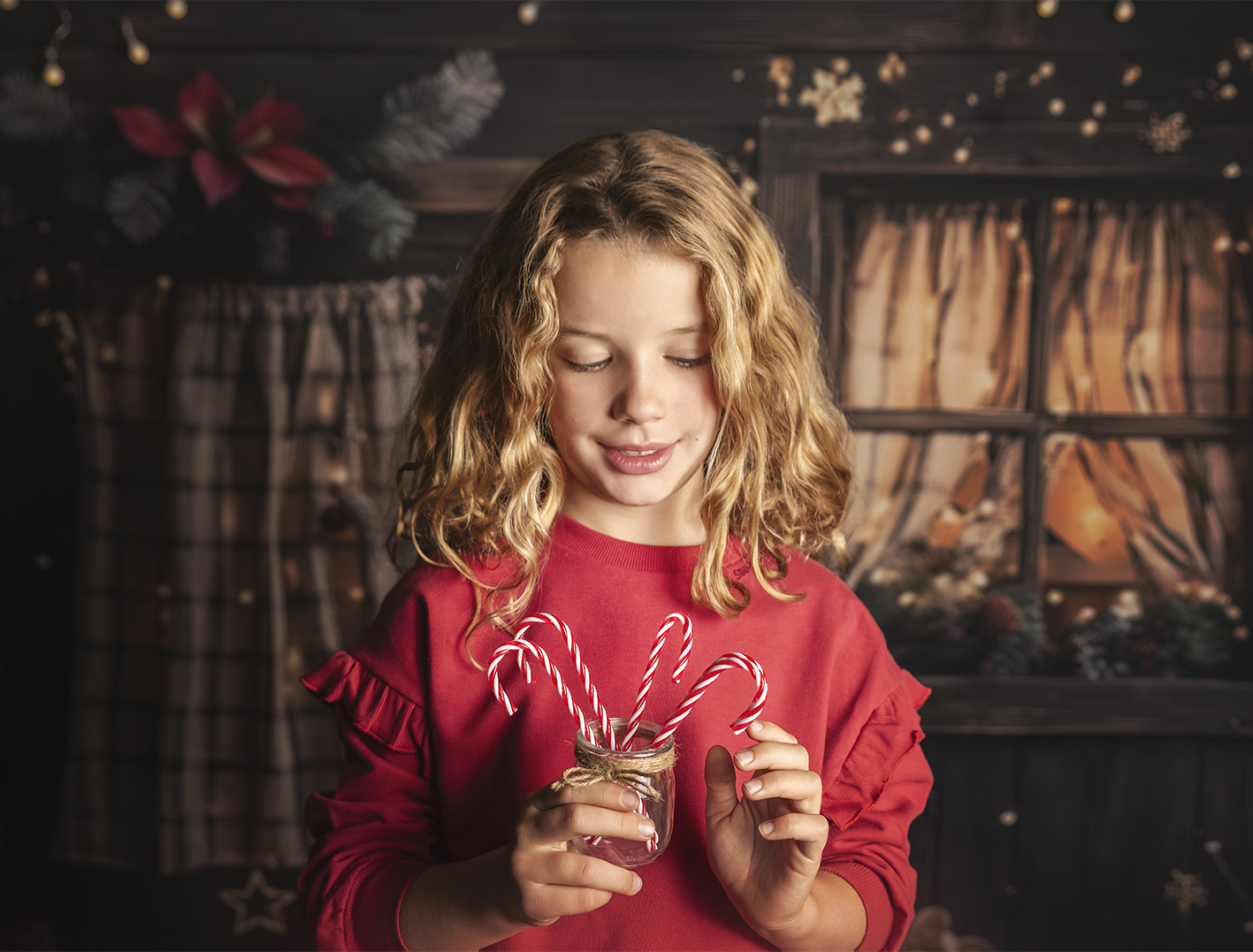 Niña con bastones de caramelo Niña con bastones de caramelo